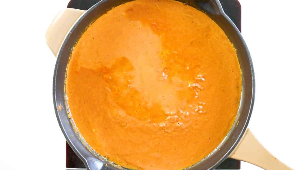 Simmering the processed butter chicken curry sauce