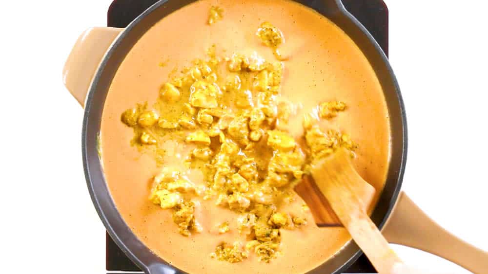 Add the chicken back to the pan with the curry sauce to simmer