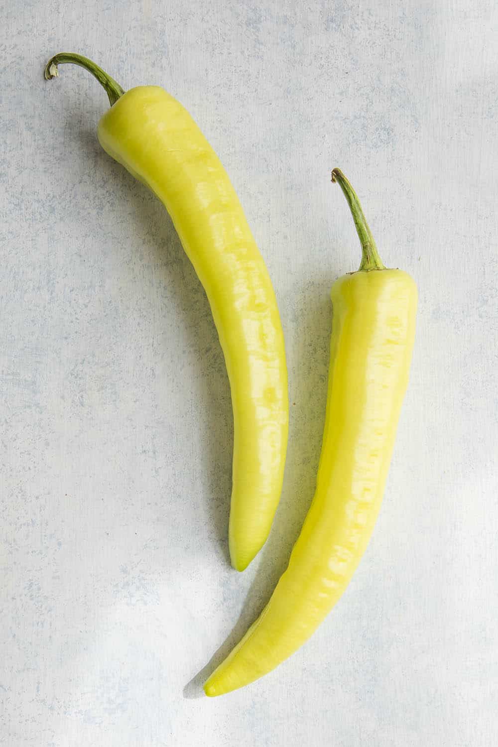 Hungarian Wax Peppers on a table.