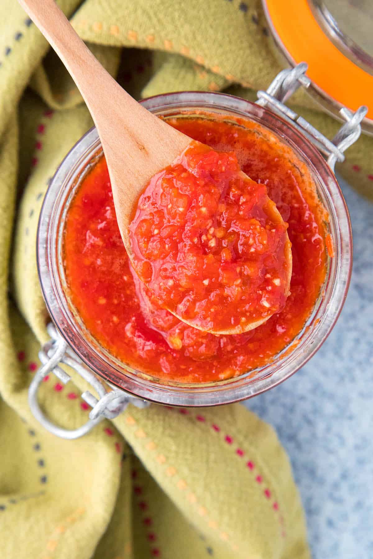 Sambal Oelek on a spoon, so vibrant and red