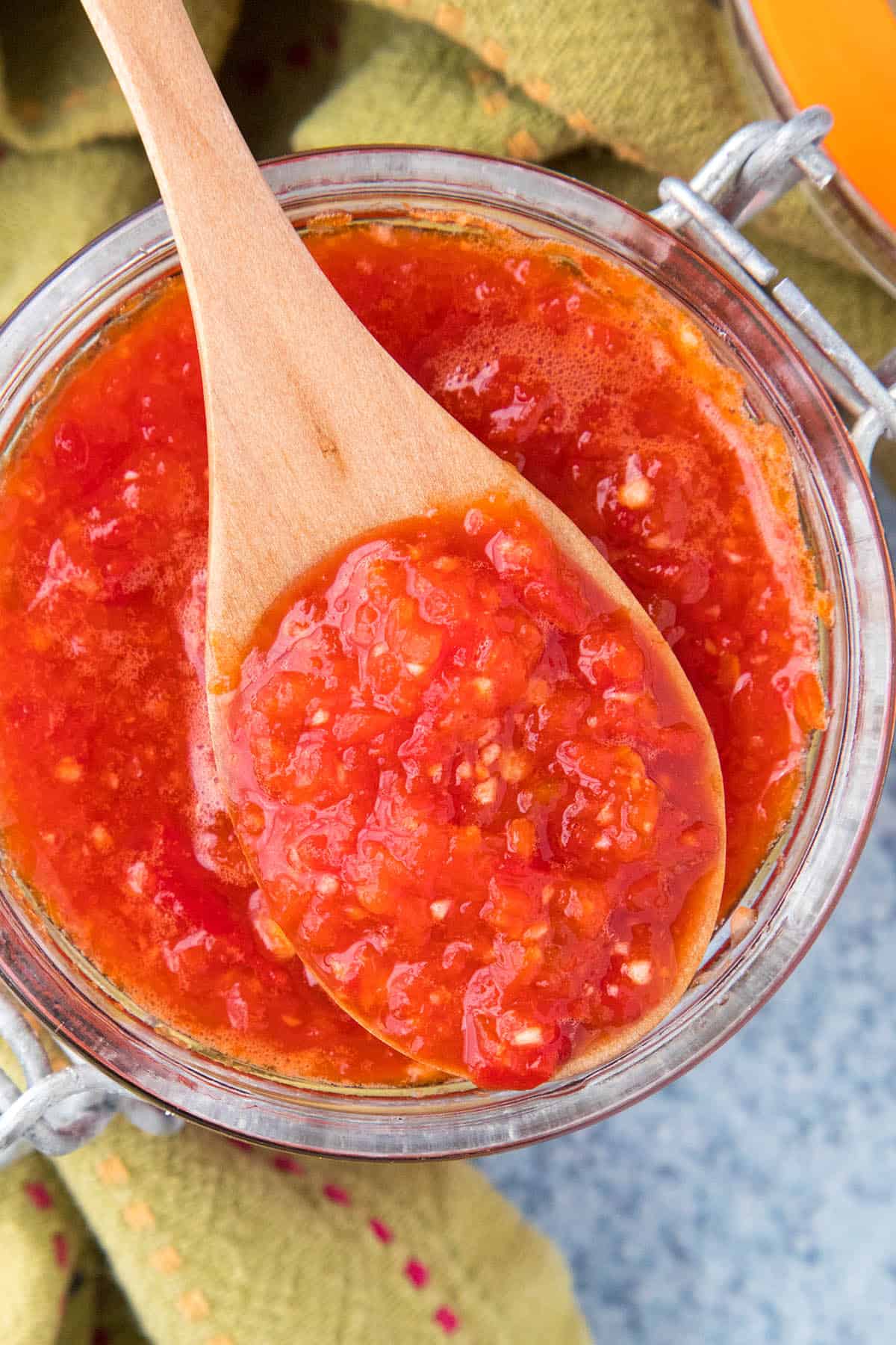Sambal Oelek on a spoon, ready to add flavor to your dishes