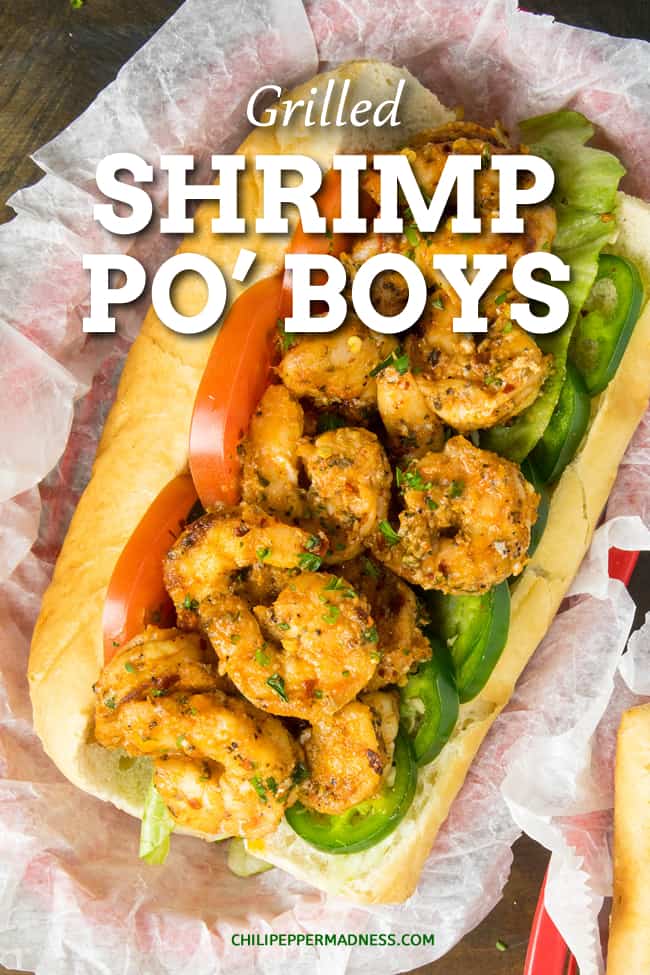 Grilled Shrimp Po' Boy Recipe - This lighter shrimp po' boy recipe is piled high with seasoned grilled shrimp served on crispy toasted French rolls, topped with creamy Cajun remoulade sauce. #Sandwich #Cajun #Shrimp