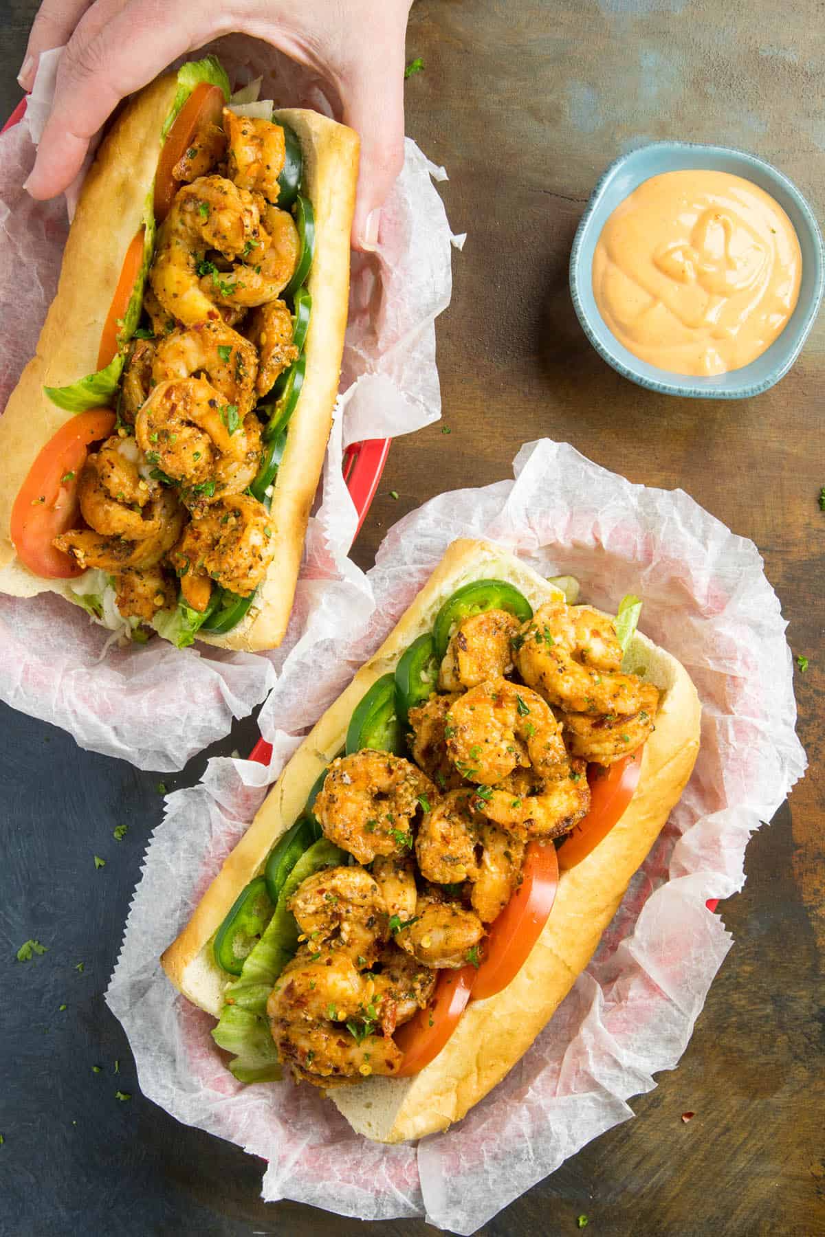 Grabbing a Shrimp Po Boy sandwich