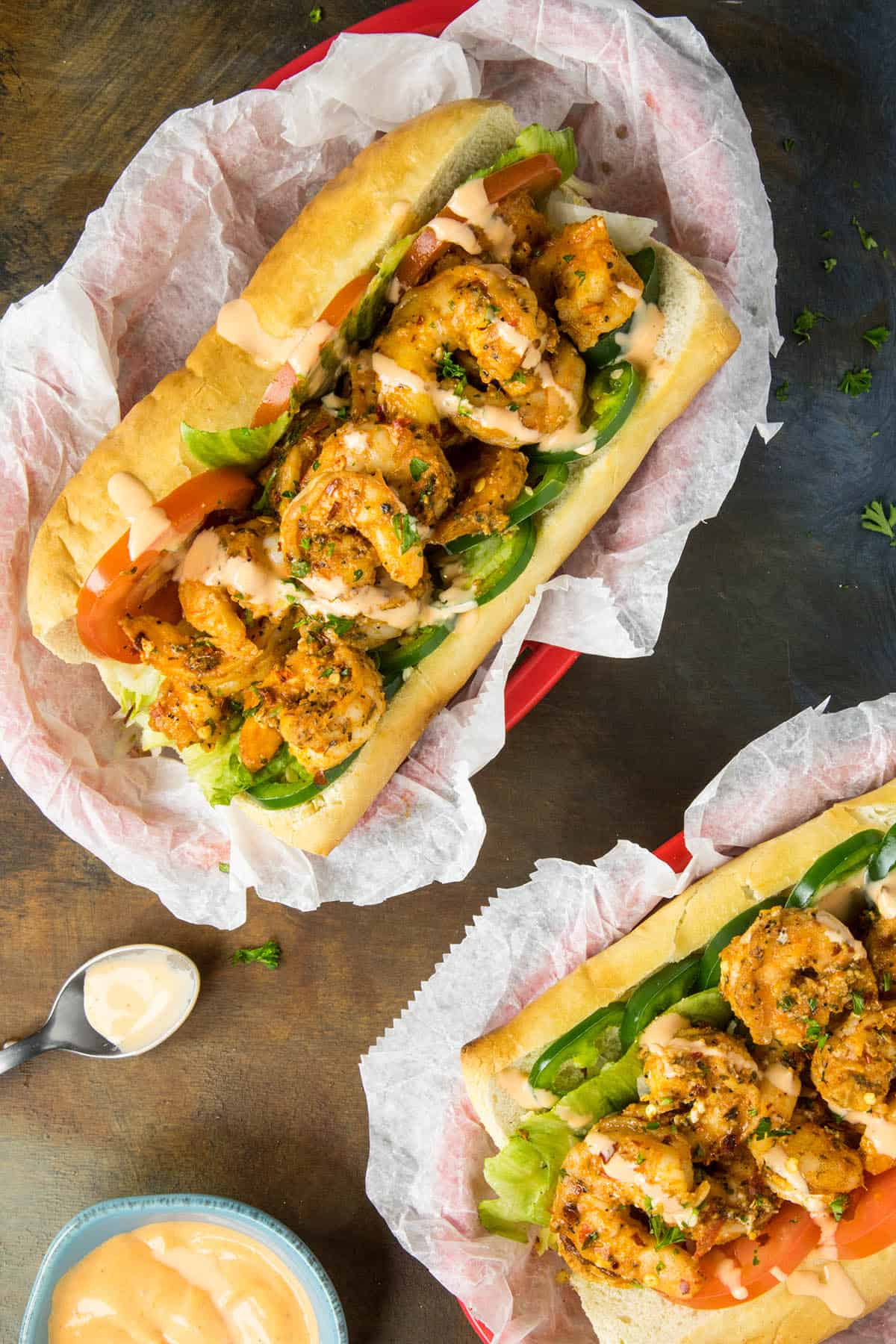 Grilled shrimp po boy sandwiches with extra Cajun sauce