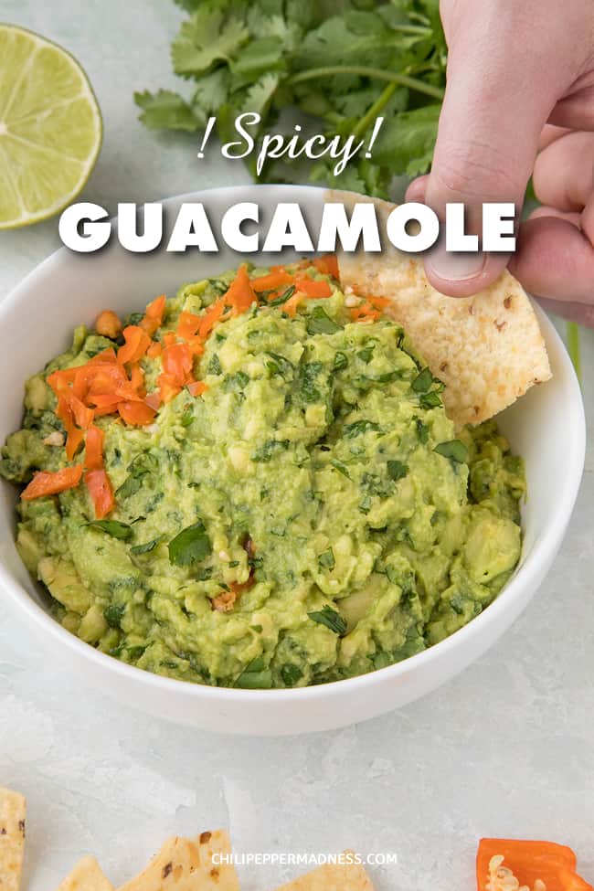 Homemade Spicy Guacamole Recipe - This creamy spicy guacamole recipe brings in the heat with diced habanero peppers for a guacamole like no other, the perfect party appetizer. #Guacamole #Appetizer #Habanero