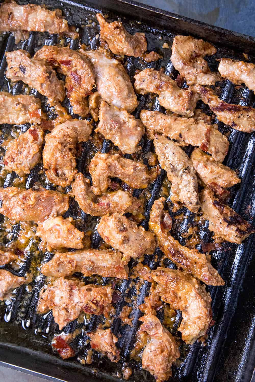 Grilling the marinated pork