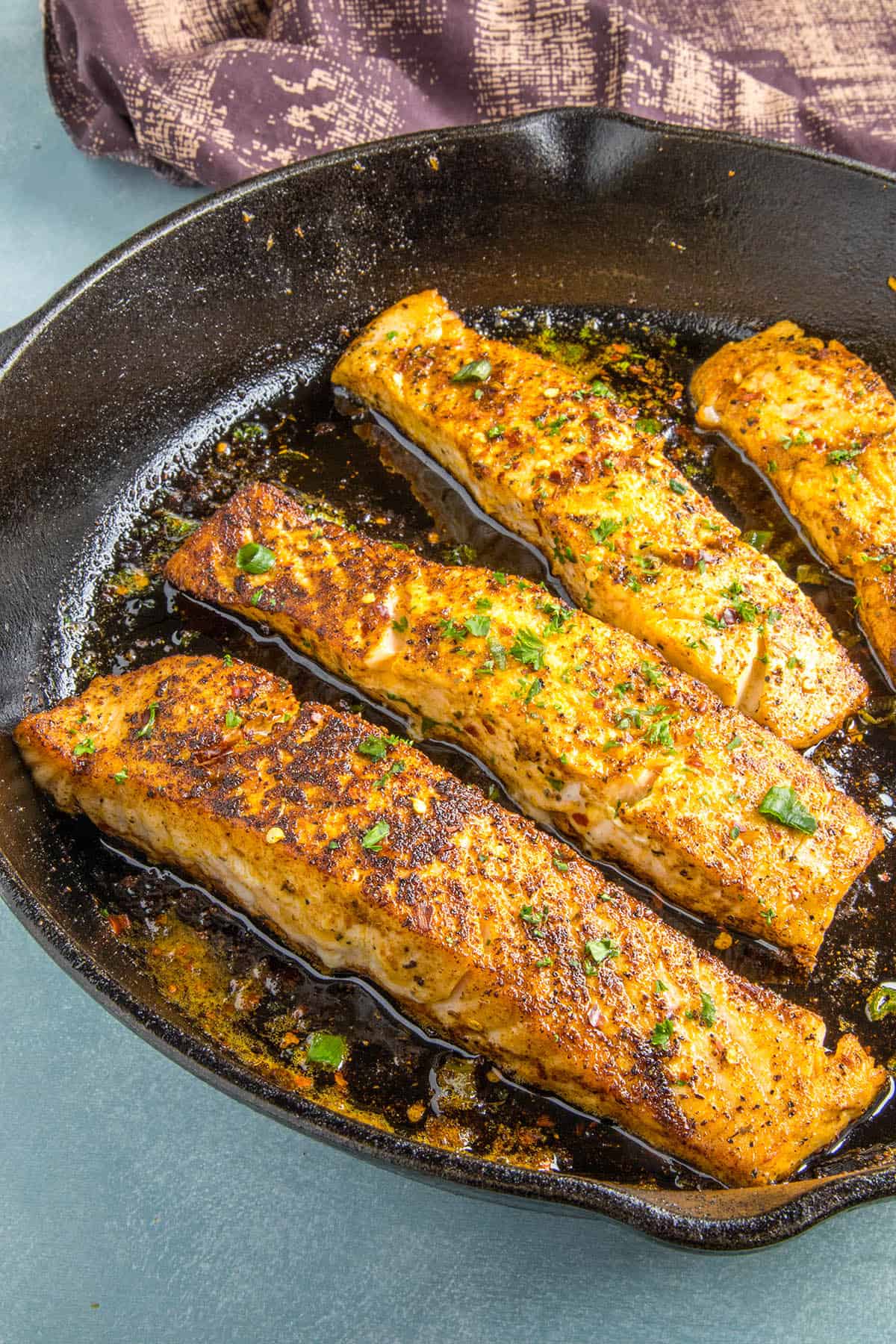 Blackened Salmon in a skillet