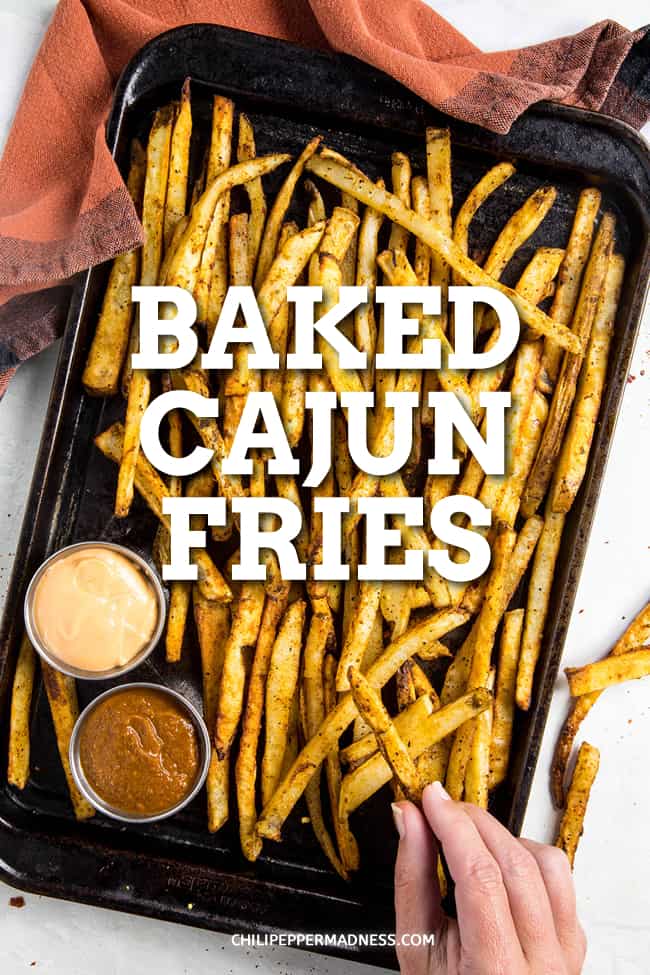 Baked Cajun Fries - This baked Cajun fries recipe makes the best crispy fries straight out of the oven. They have just the right amount of spice and make the best side dish. #Cajun #FrenchFries #SideDish