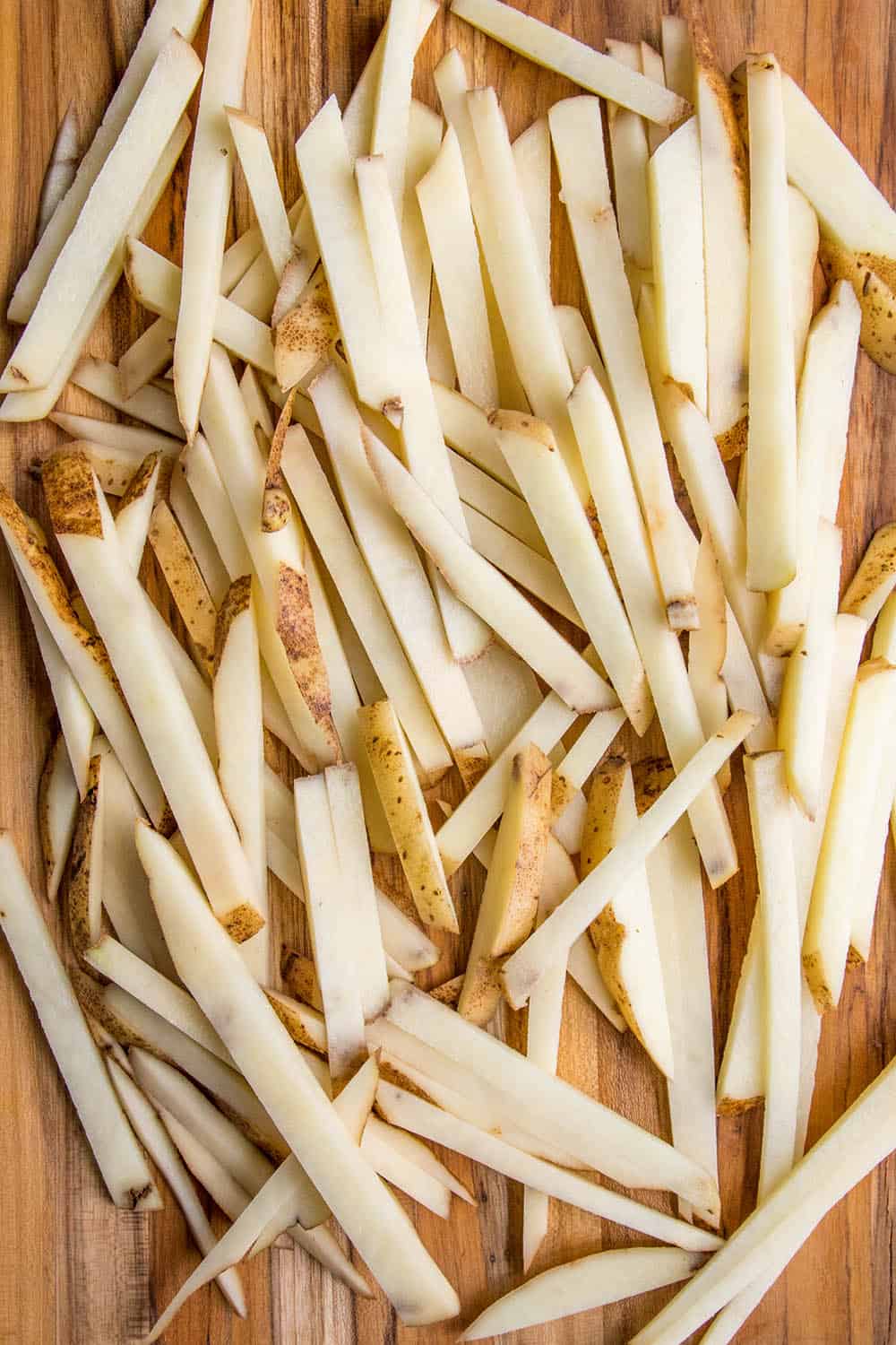 Potatoes sliced into "French fry" slices