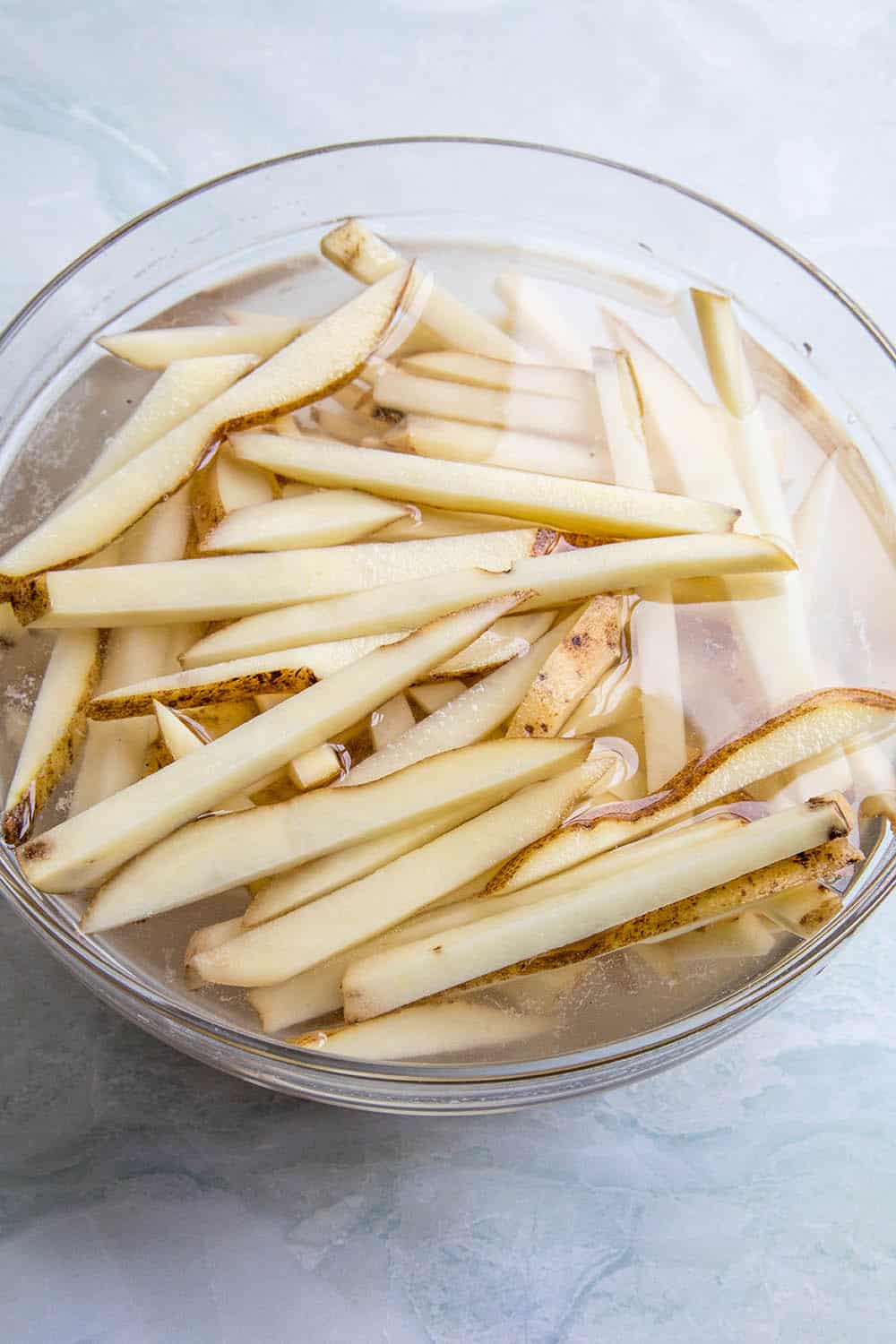 Soaking my sliced potatoes in a bowl of water