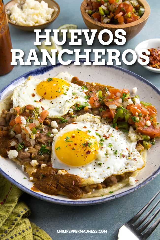 Easy Huevos Rancheros Recipe - This easy huevos rancheros recipe serves up ranch style eggs with fresh pico de gallo, refried beans and homemade ranchero sauce over corn tortillas. #Breakfast #MexicanFood