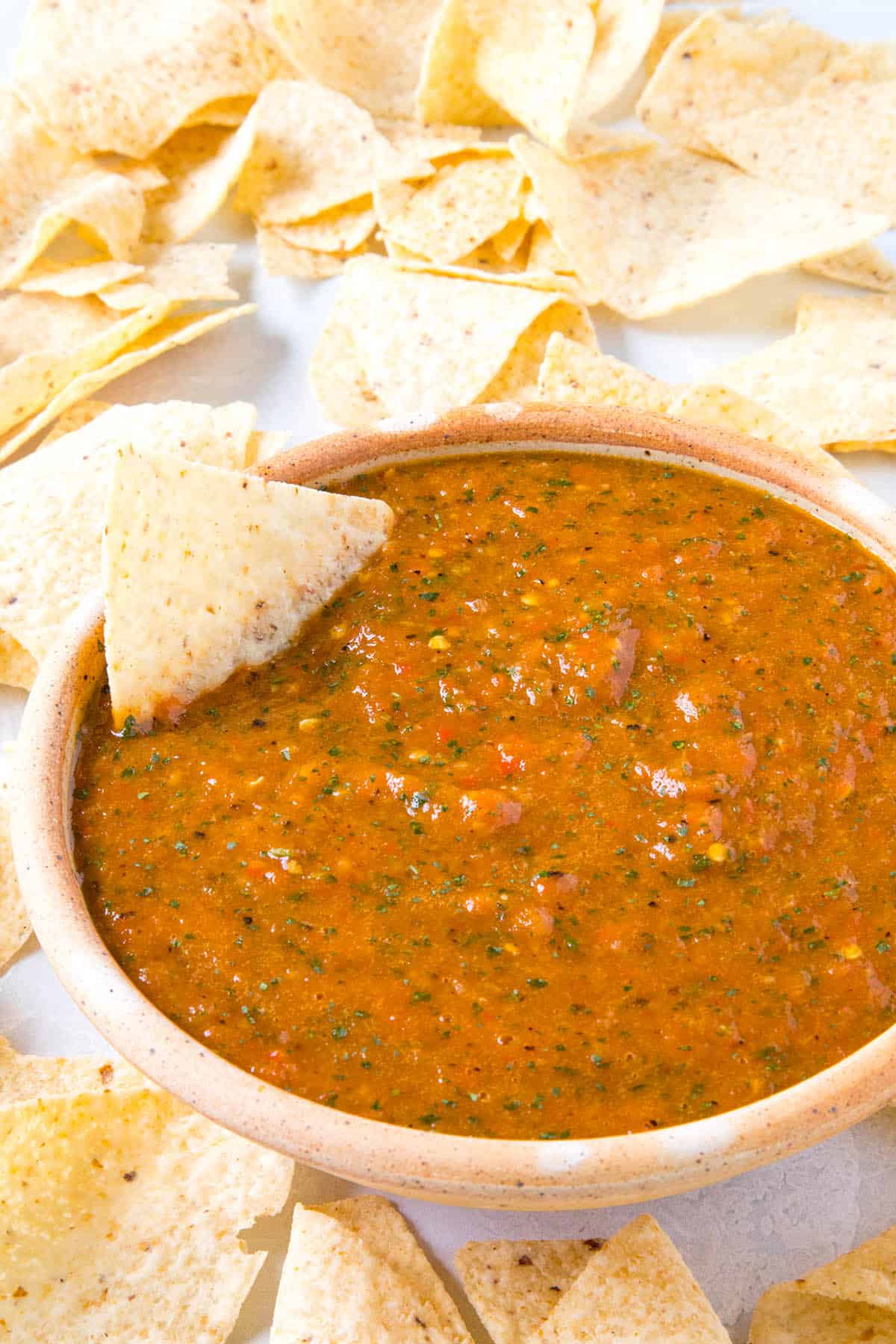 Roasted Mango-Habanero Salsa in a bowl with chips, ready to serve