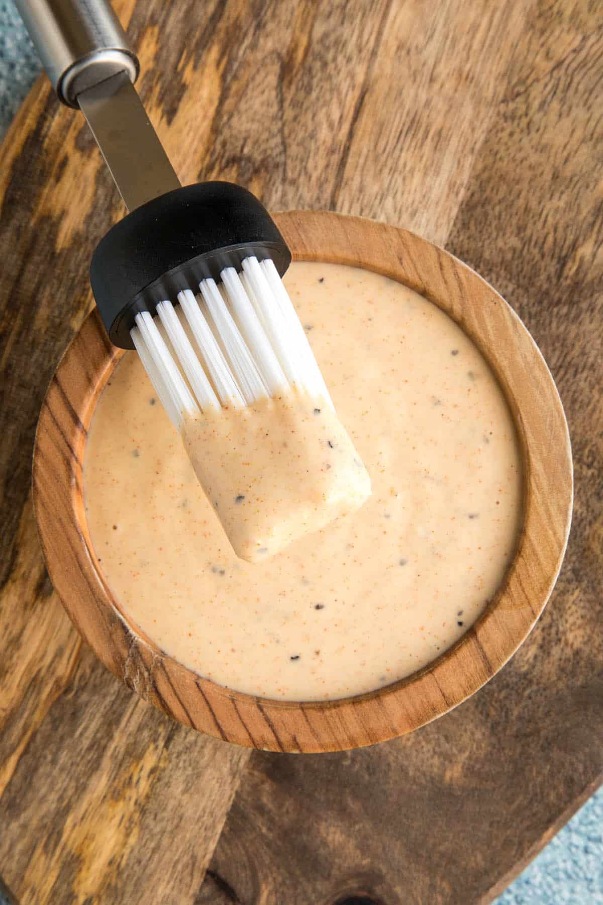 Alabama White BBQ Sauce on a basting brush