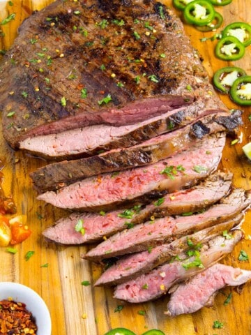 Carne Asada served on a wooden board