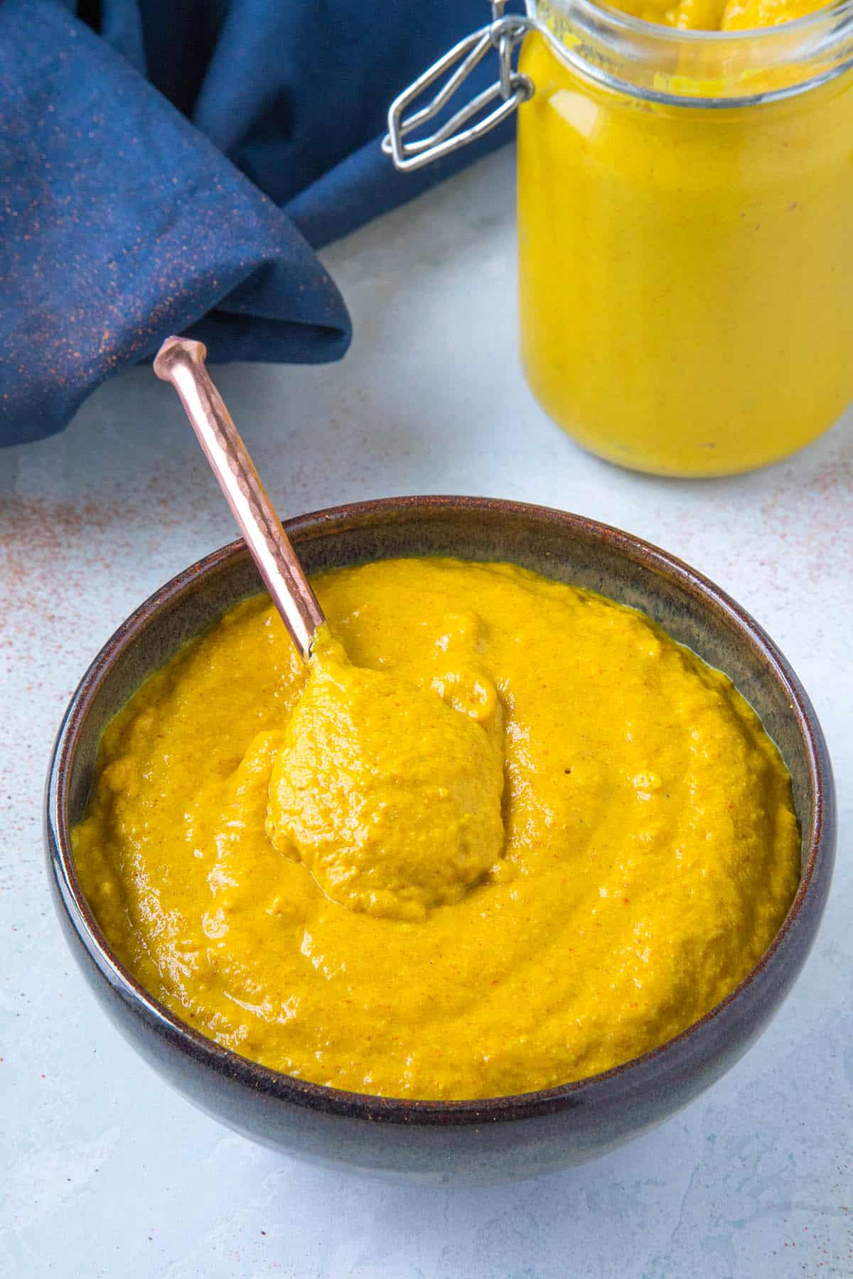 Homemade Yellow Mustard in a bowl, ready to serve