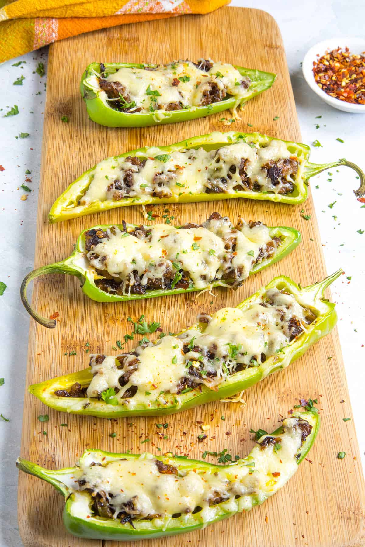 Stuffed Anaheim Peppers on a serving board