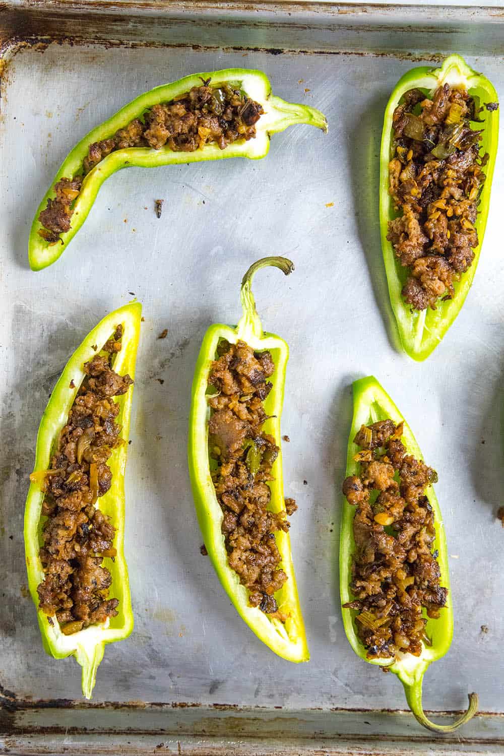 Anaheim peppers stuffed with spicy cooked sausage