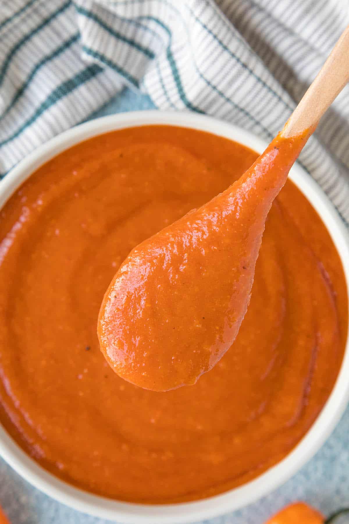 Mango Habanero BBQ Sauce coating a spoon