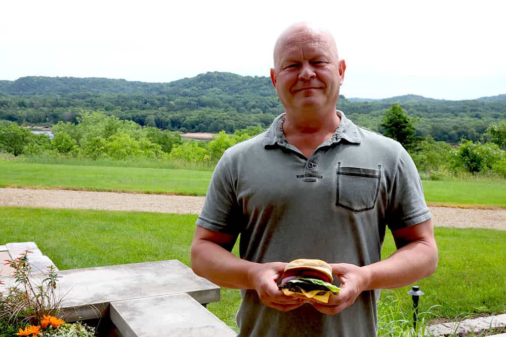 Mike Hultquist at Culver's, with a burger in his hand