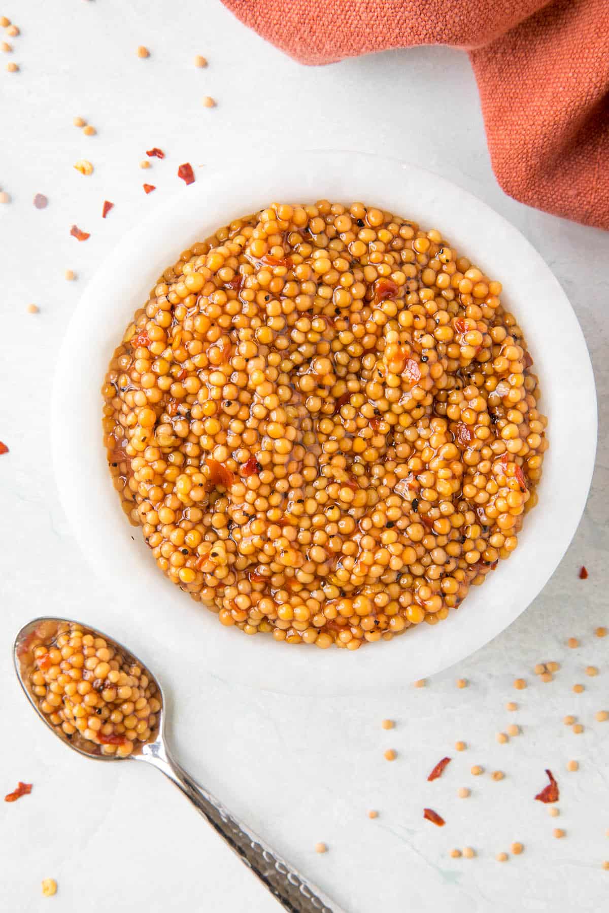 Pickled Mustard Seeds with a spoonful of plump, flavor seeds