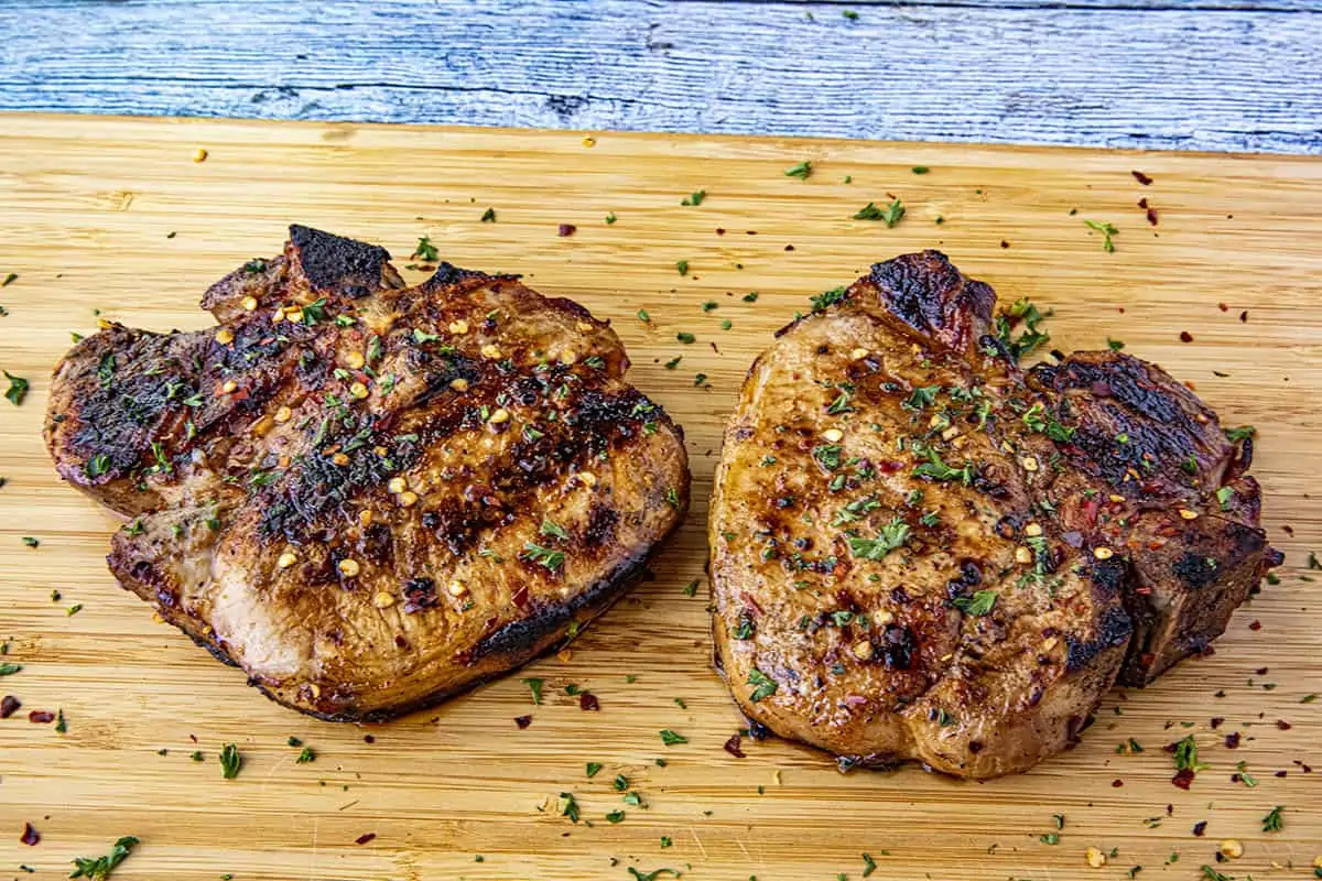 These pork chops are flavorful and juicy from a good grilled Pork Chop Marinade