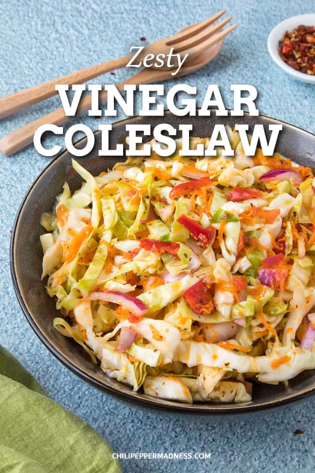 Vinegar Coleslaw Recipe - Sweet and Tangy - This vinegar coleslaw recipe is a no-mayo coleslaw made with finely shredded cabbage, carrots, bell pepper and onion tossed in a tangy vinaigrette. It\'s the perfect side dish. #Coleslaw #SideDish