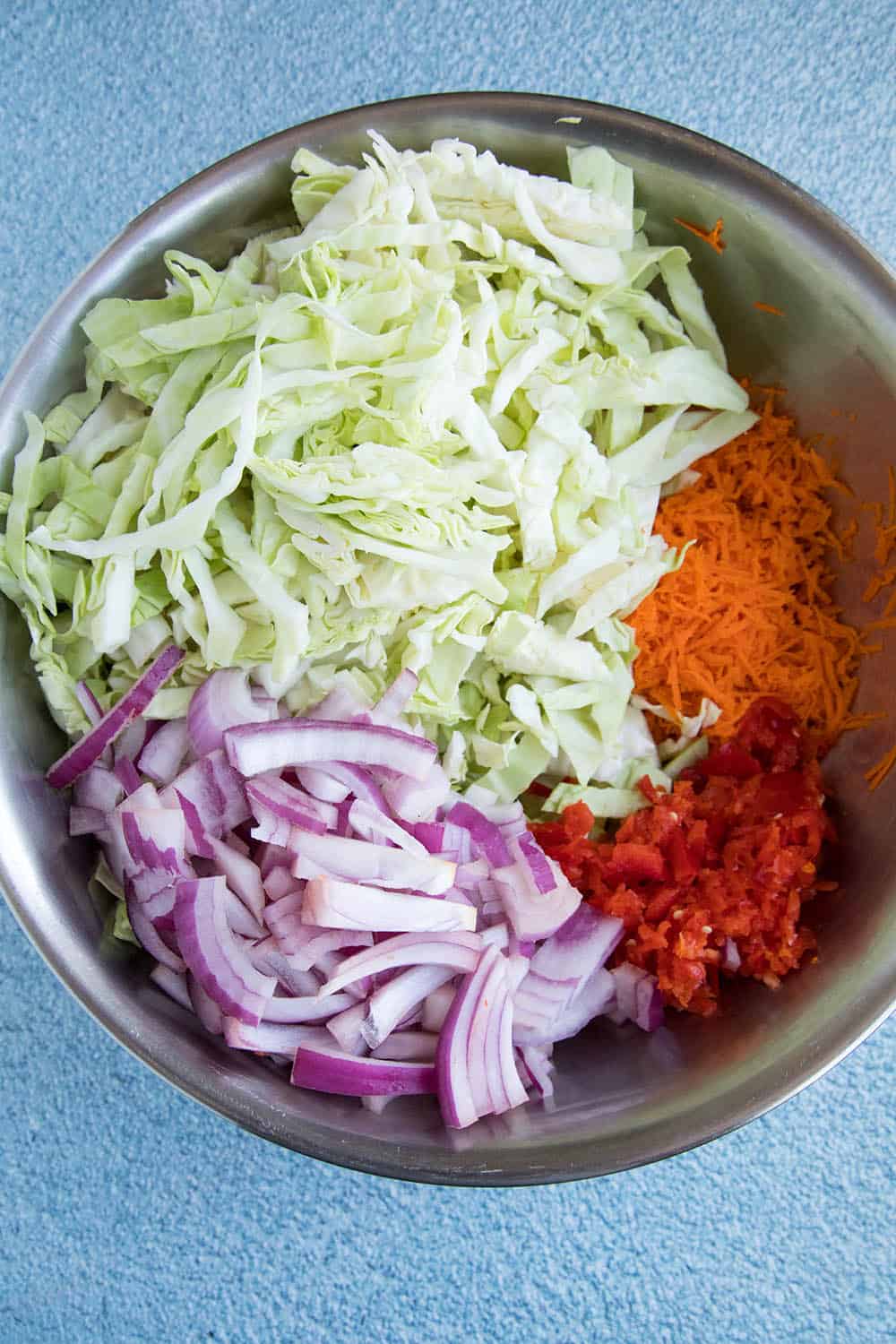 Shredded cabbage, onion, bell pepper and carrot