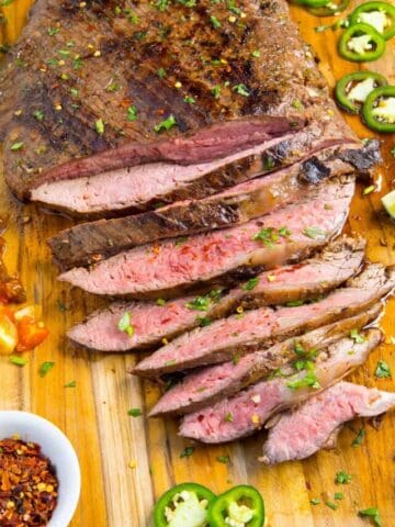 Carne Asada served on a wooden board