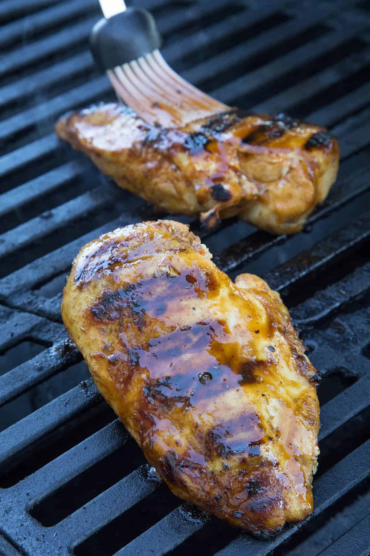 Basting the Honey Sriracha Chicken