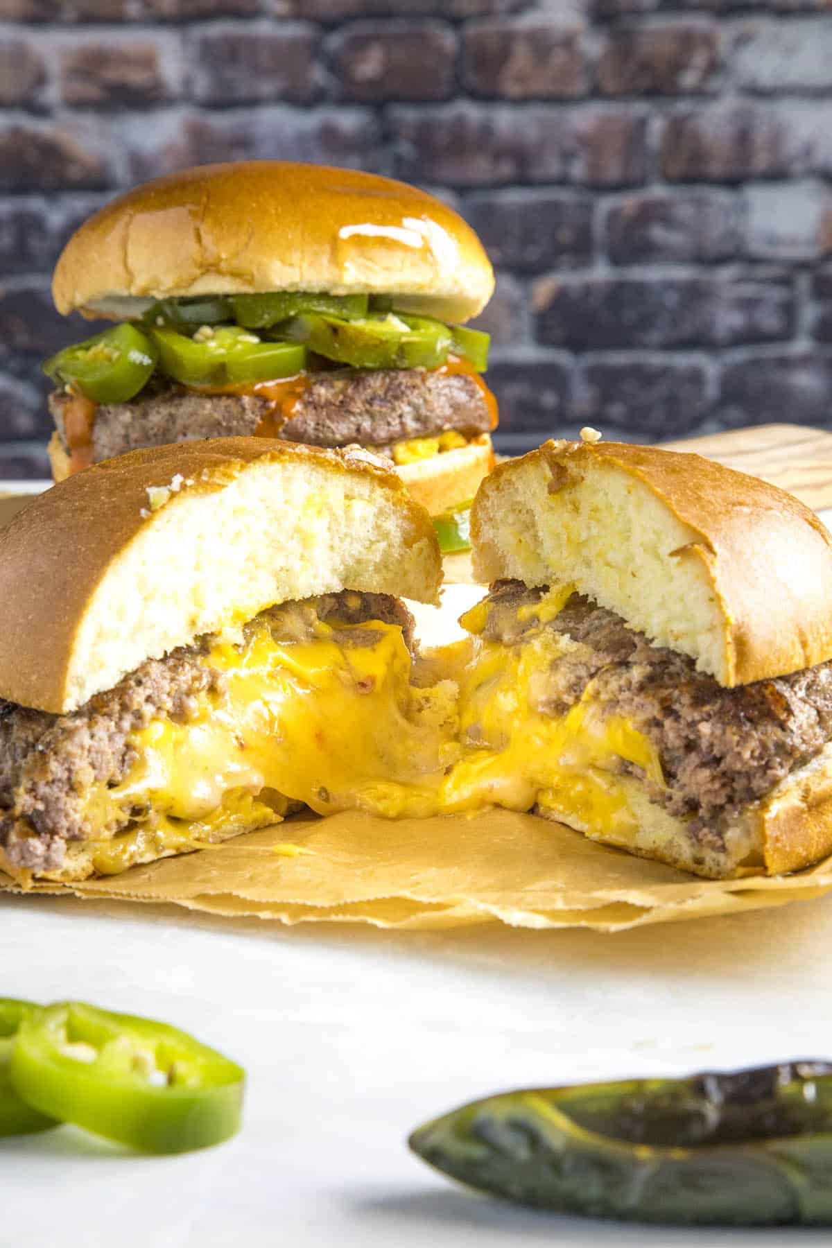 Juicy Lucy Burgers oozing melty cheese