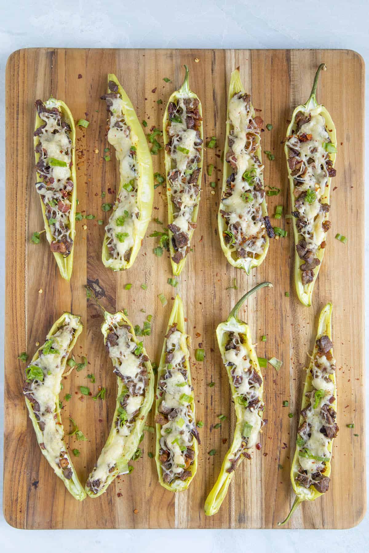 Stuffed Banana Peppers laid out on a serving board