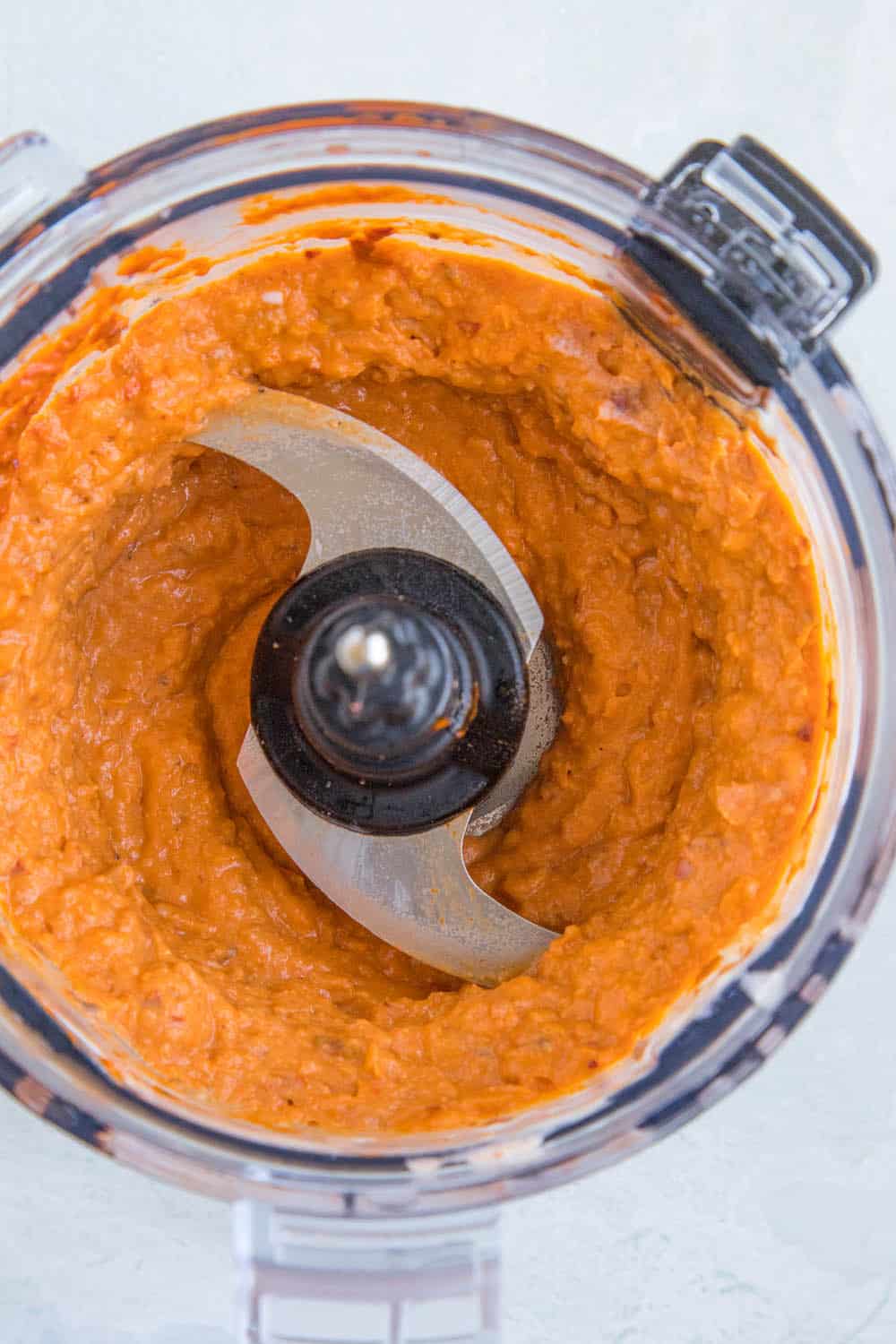 Creamy White Bean Dip with Harissa processed in the food processor