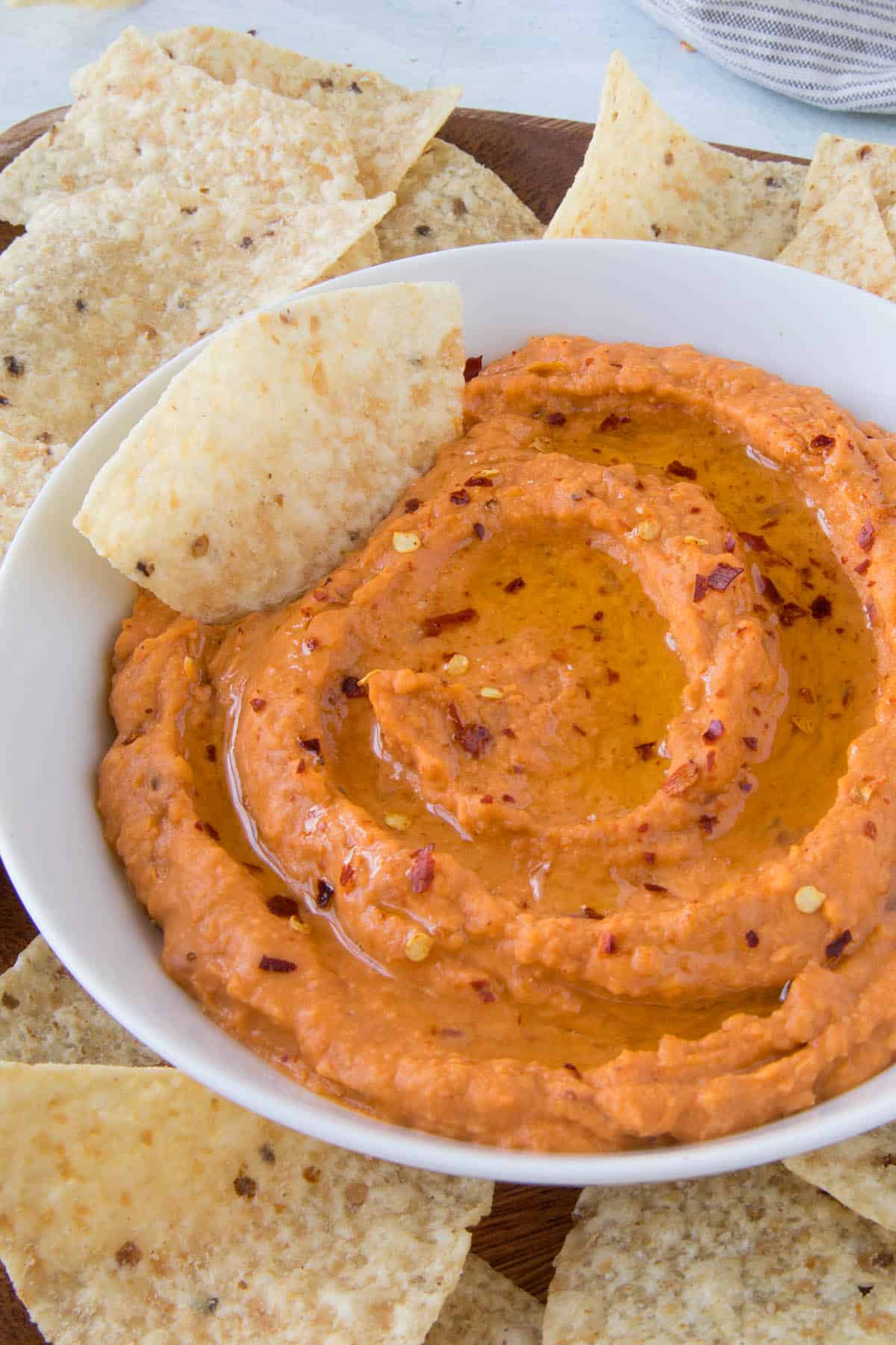 Creamy White Bean Dip with Harissa, served with chips