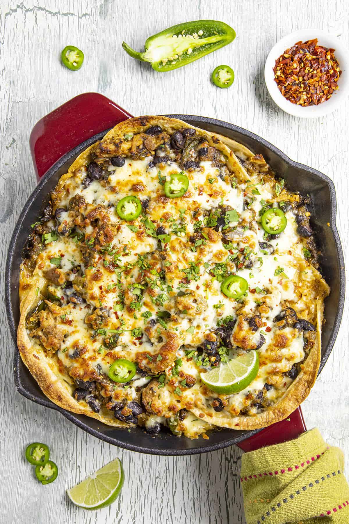 Chicken Enchilada Casserole Verde in a hot pan, ready to serve