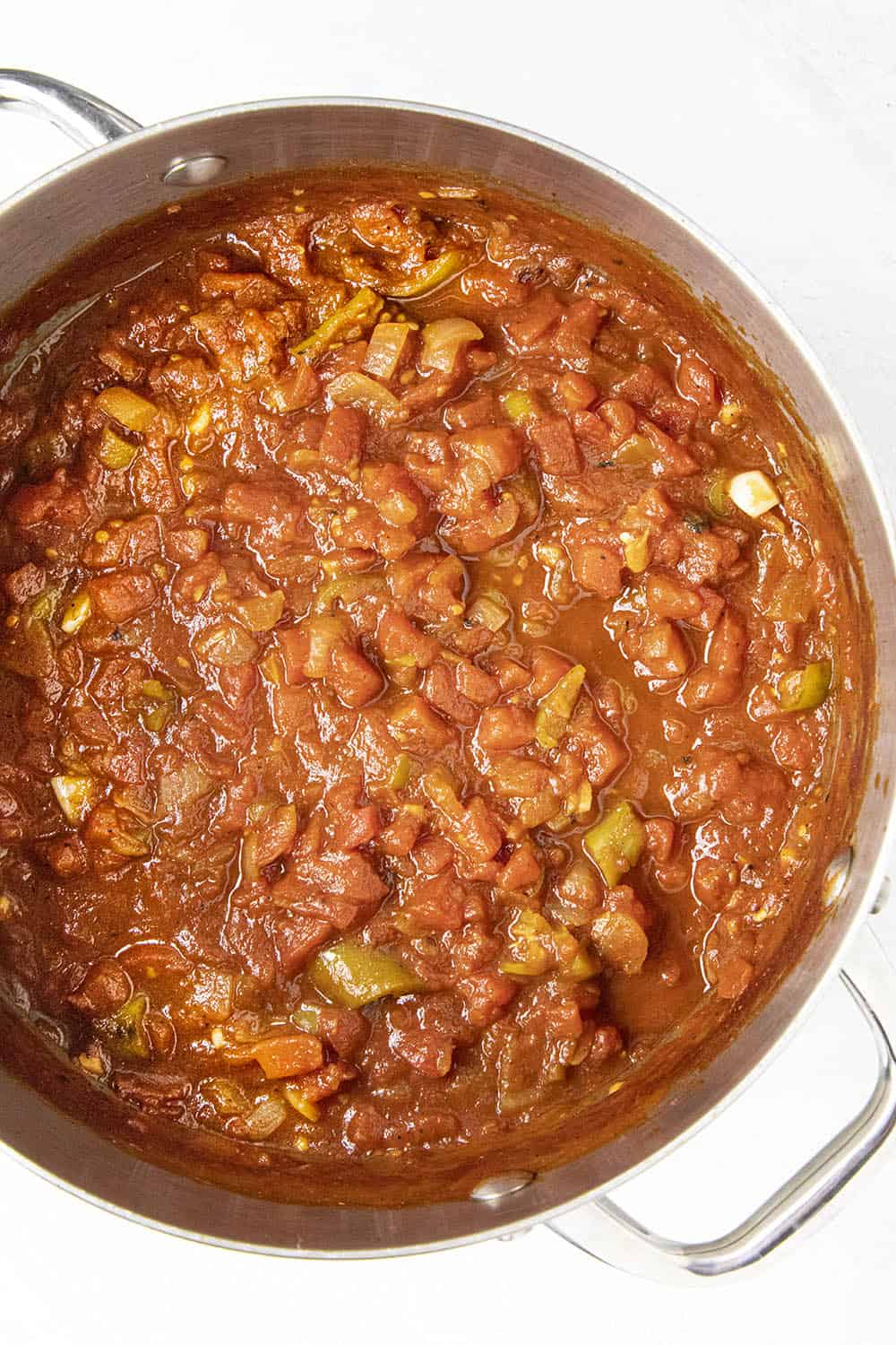 Cooking down the ingredients to make homemade ketchup