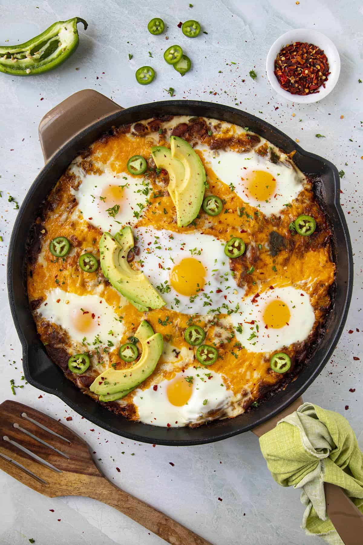 Huevos Rancheros Casserole in a pan, with eggs baked right in