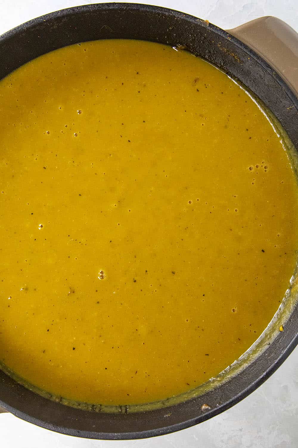 Pumpkin soup in a pot, just processed smooth