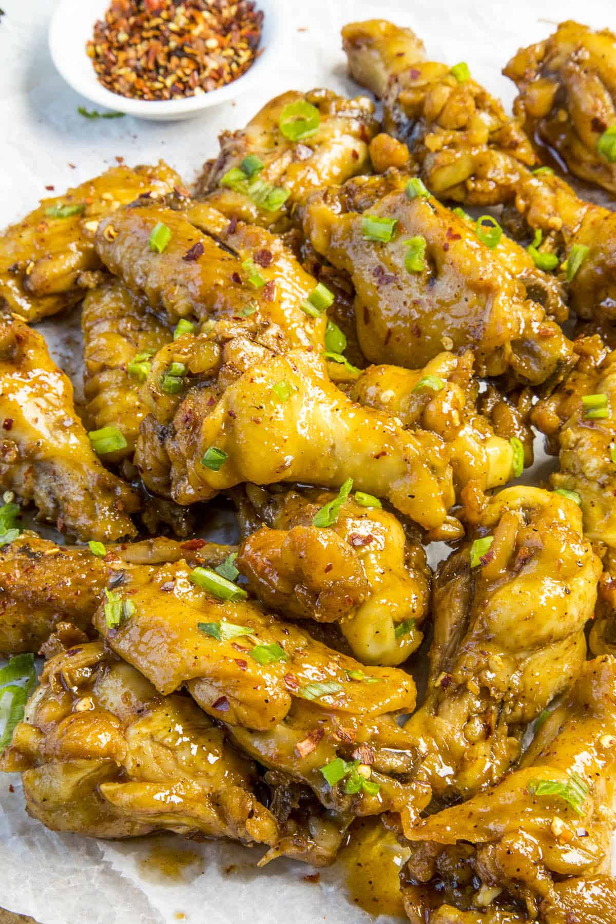 Sticky Chicken Wings, glistening with sticky sauce.