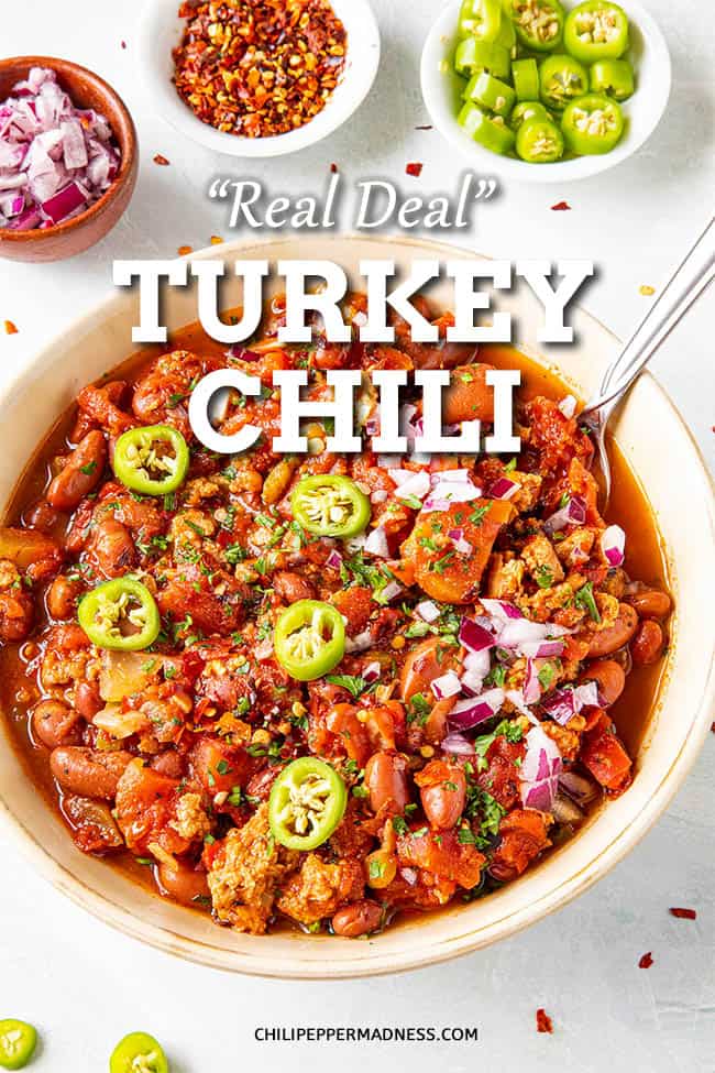 Real Deal Turkey Chili Recipe - This is the best turkey chili recipe you’ll ever try, made with two types of chili powder, fire roasted tomatoes, lots of seasonings and plenty of ground turkey. It truly is the real deal when it comes to flavor. #Chili #GroundTurkey #Spicy
