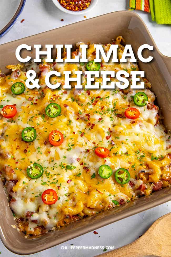 Cheesy Chili Mac Recipe - This chili mac recipe is chunky, cheesy and ultimately comforting with lots of seasonings, spicy chunky chili and so much more. It\'s an easy one pot meal. #Chili #MacandCheese #ChiliMac