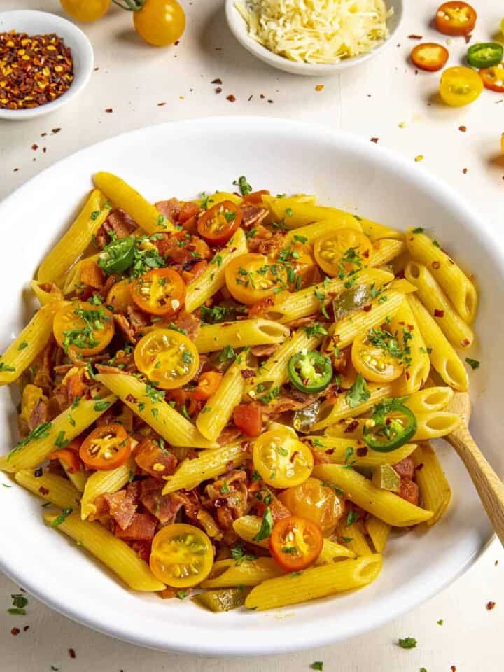 Penne Arrabbiata served in a white bowl