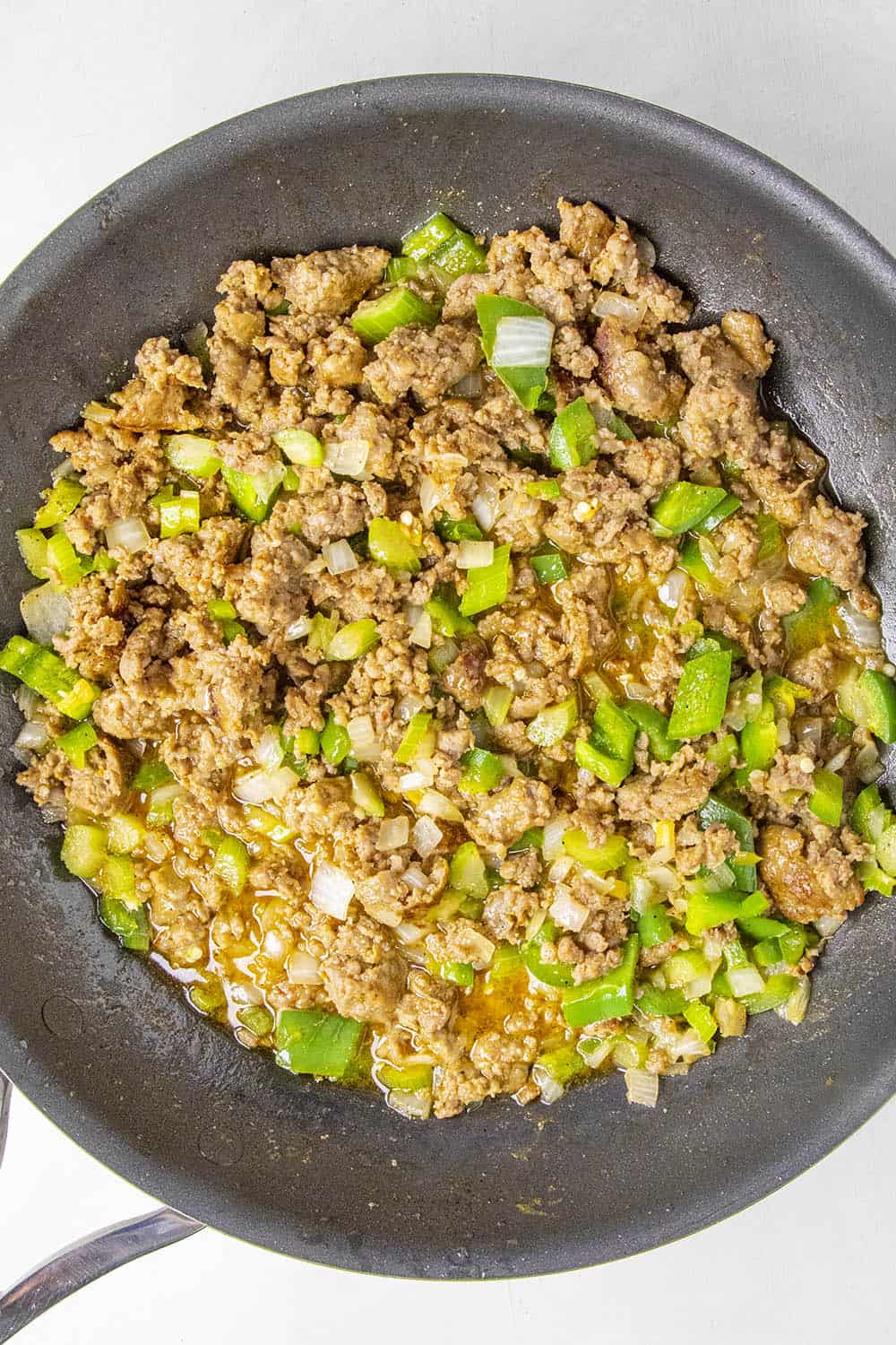 Sausage cooked down with peppers and onions for making sausage stuffing