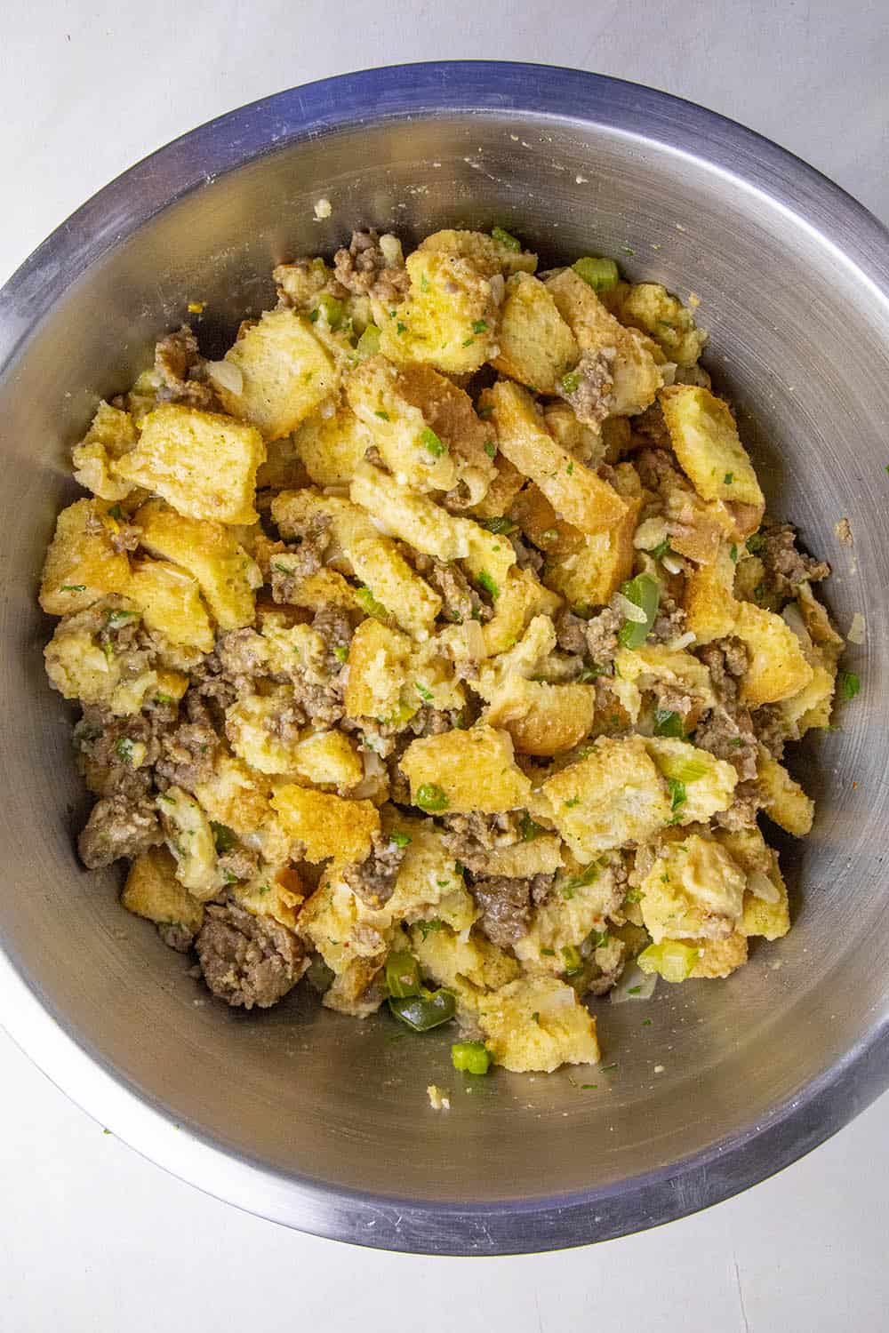 Sausage stuffing mixed up in a bowl, ready for the baking dish