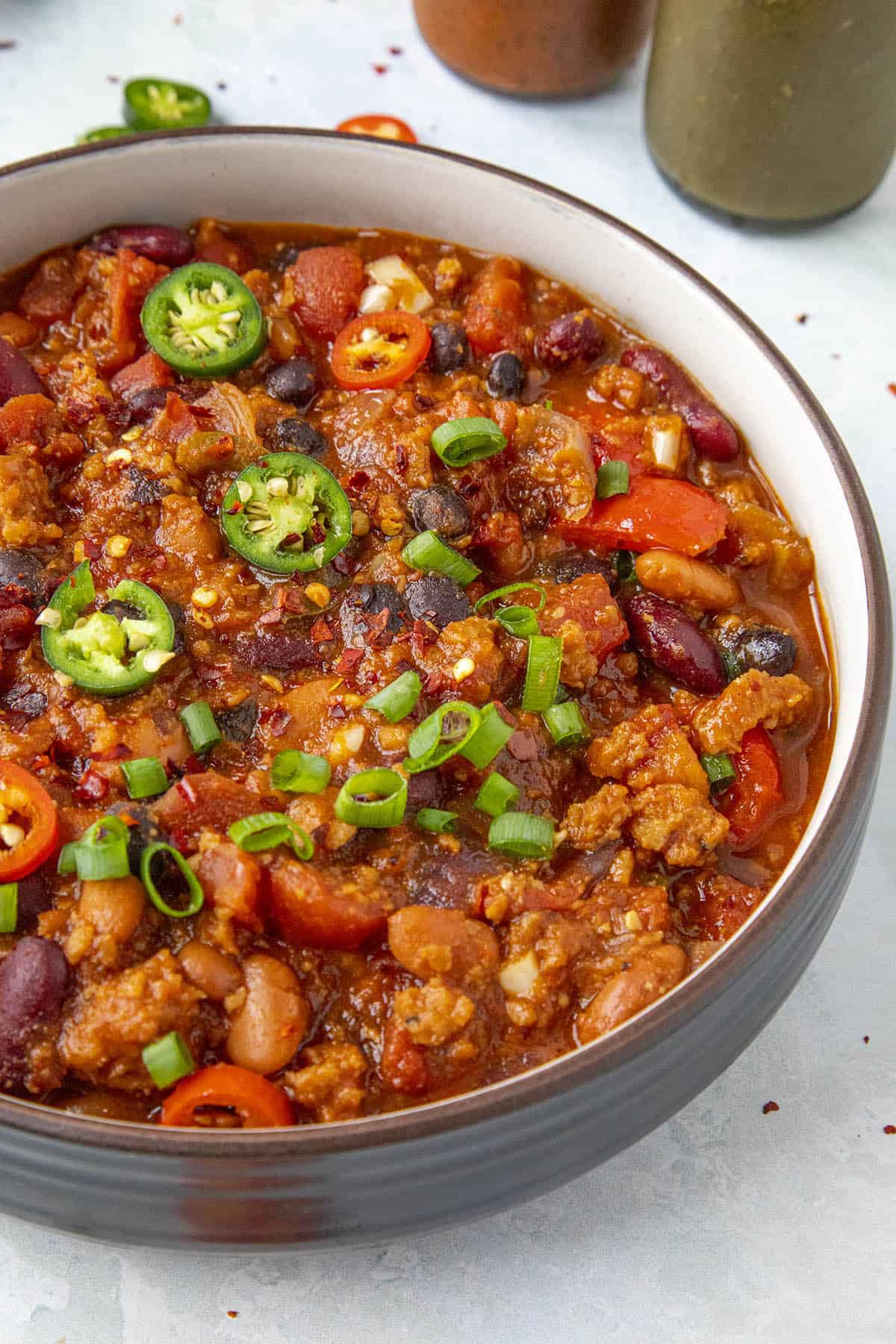 Chunky Vegetarian Chili in a bowl with garnish