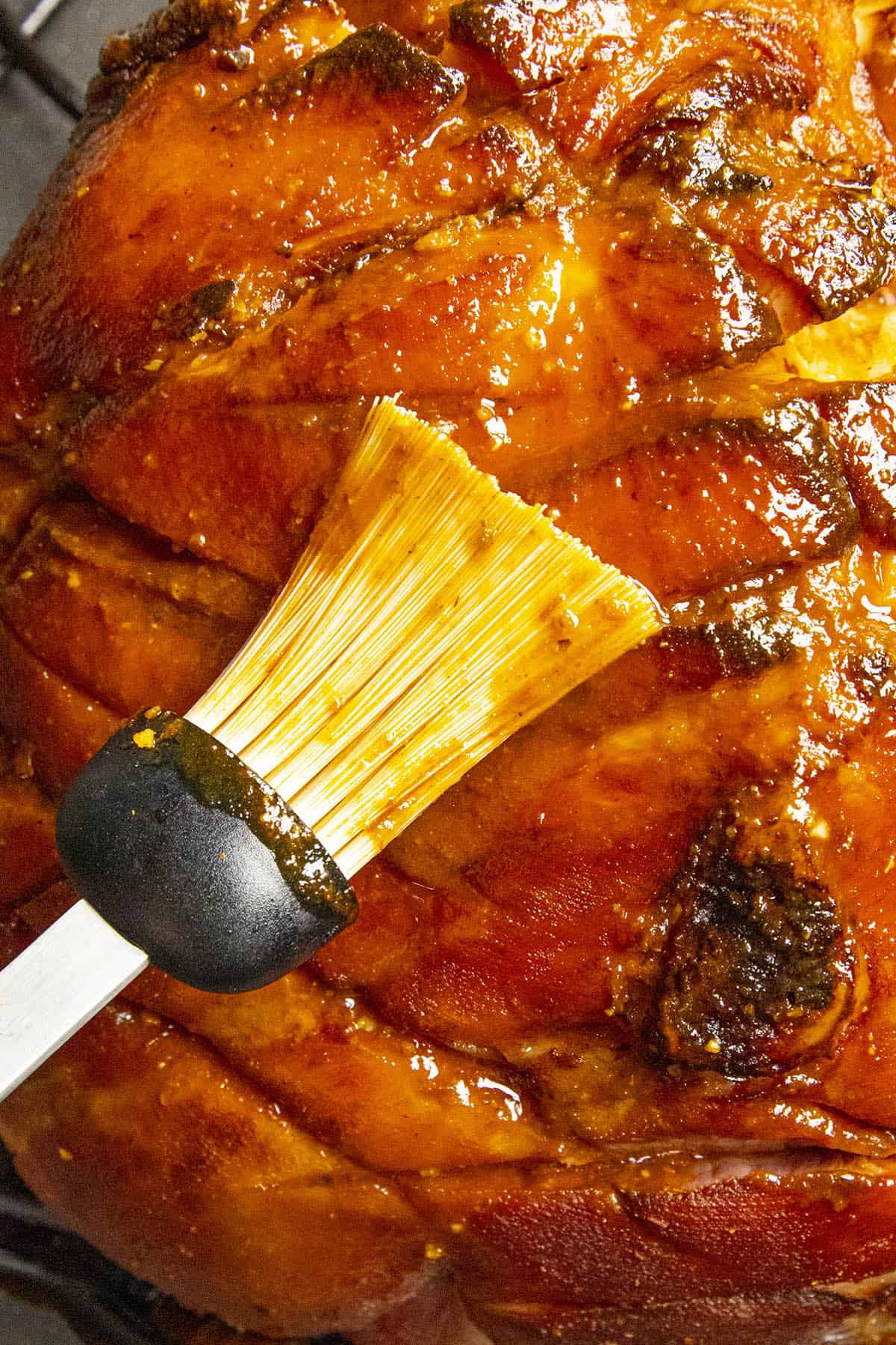 Glazing the baked ham