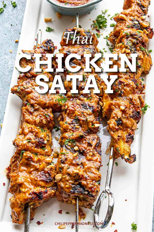 Chicken Satay with Easy Thai Peanut Sauce - This Thai chicken satay recipe marinates chopped chicken for maximum flavor, threads them onto skewers for the grill then slathers them with spicy Thai peanut sauce. #chickensatay #thaichicken #peanutsauce #spicyfood