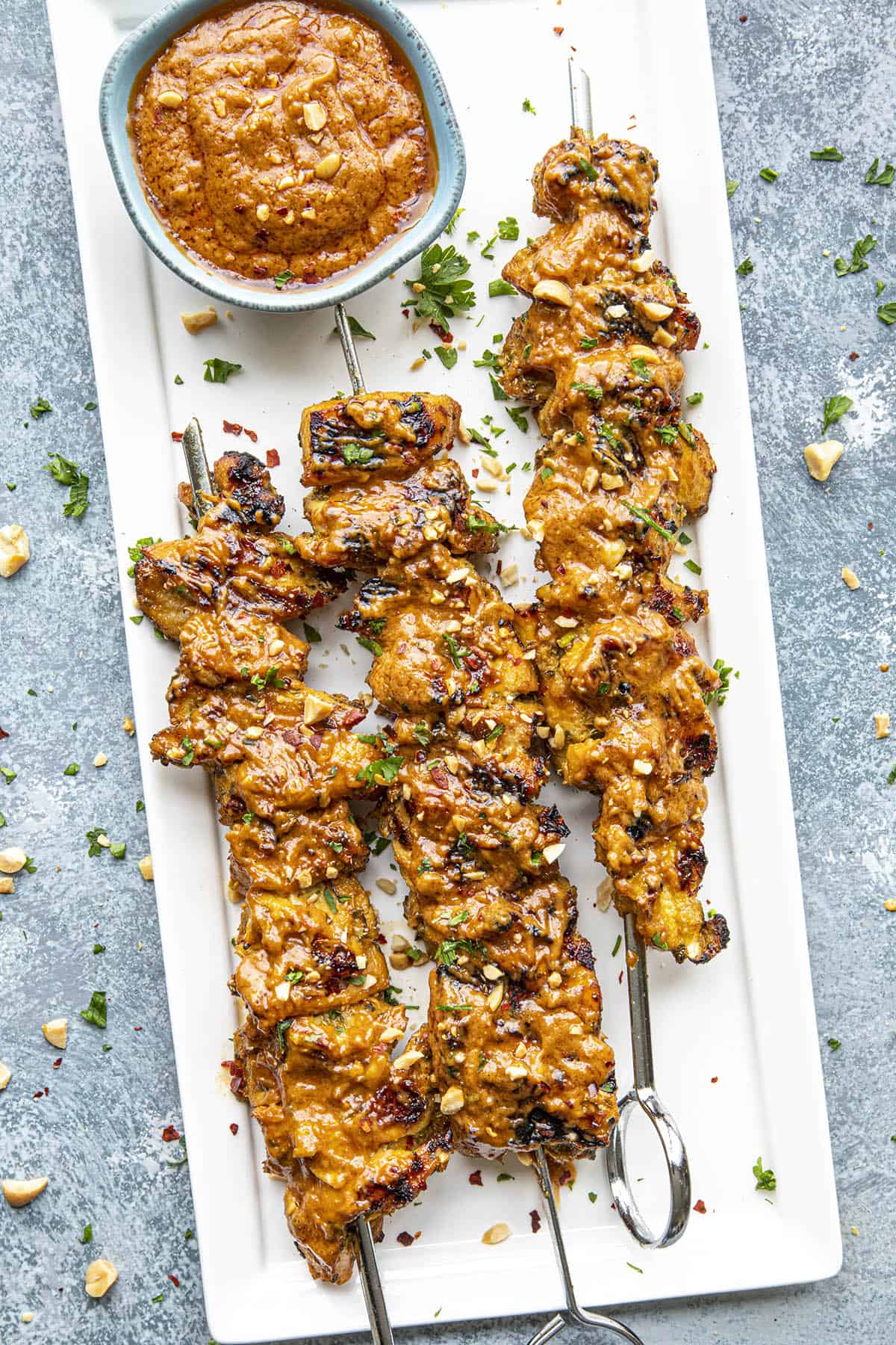 Thai Chicken Satay skewers on a plate, ready to serve