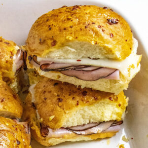A Crack Ham and Cheese Slider fresh and hot from the baking dish