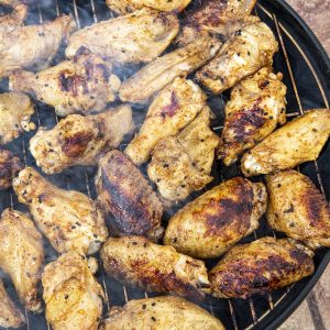 Grilled chicken on the grill, nicely charred