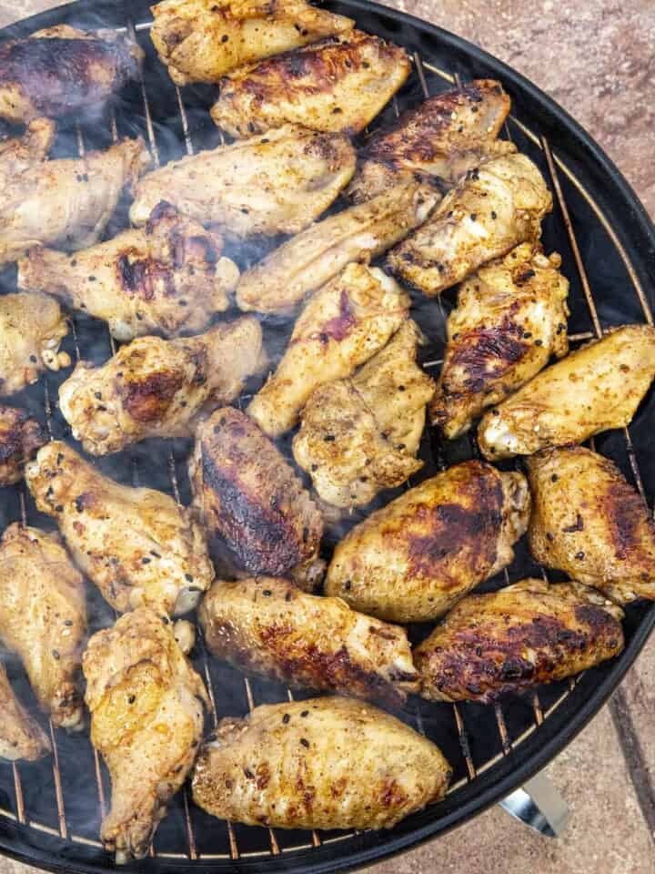 Grilled chicken on the grill, nicely charred
